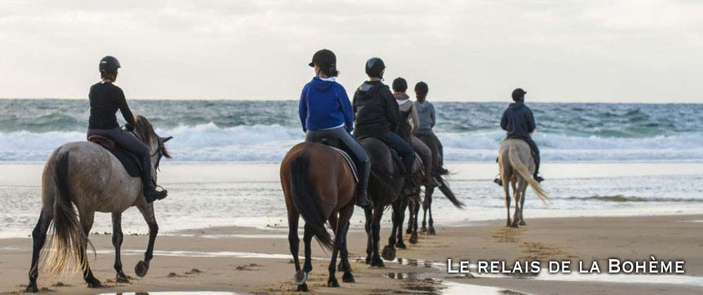 balade à cheval et equitation sur la plage de lacanu et au porge